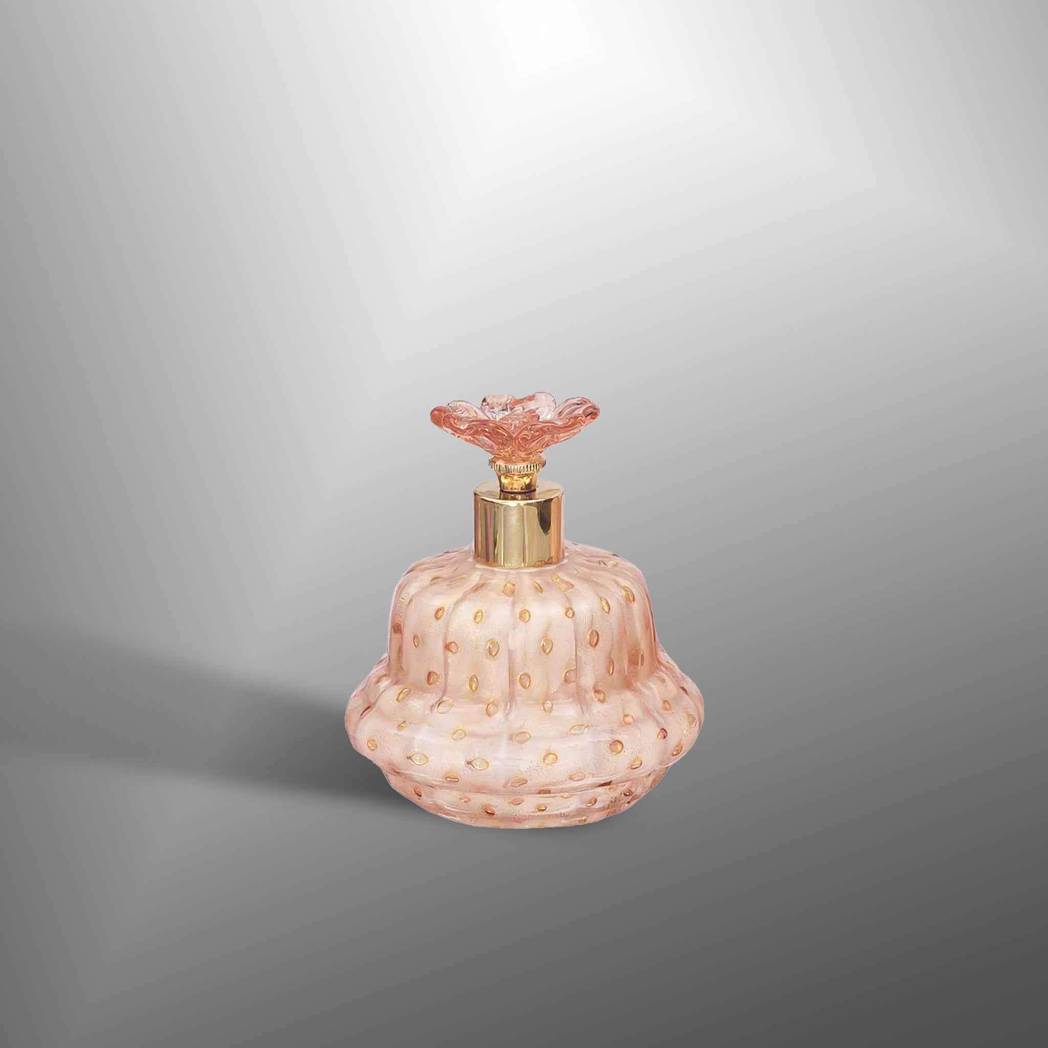 Pink "incamiciato" parfume bottles