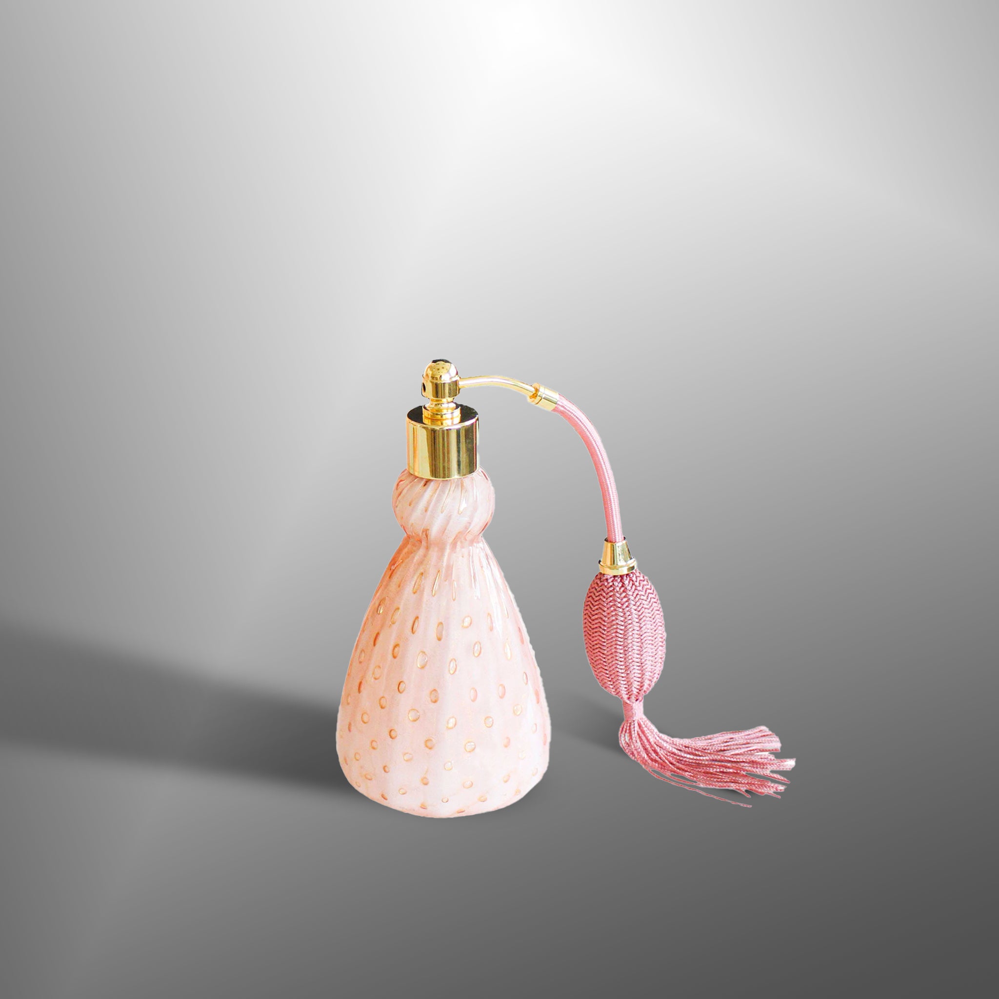 Pink "incamiciato" parfume bottles